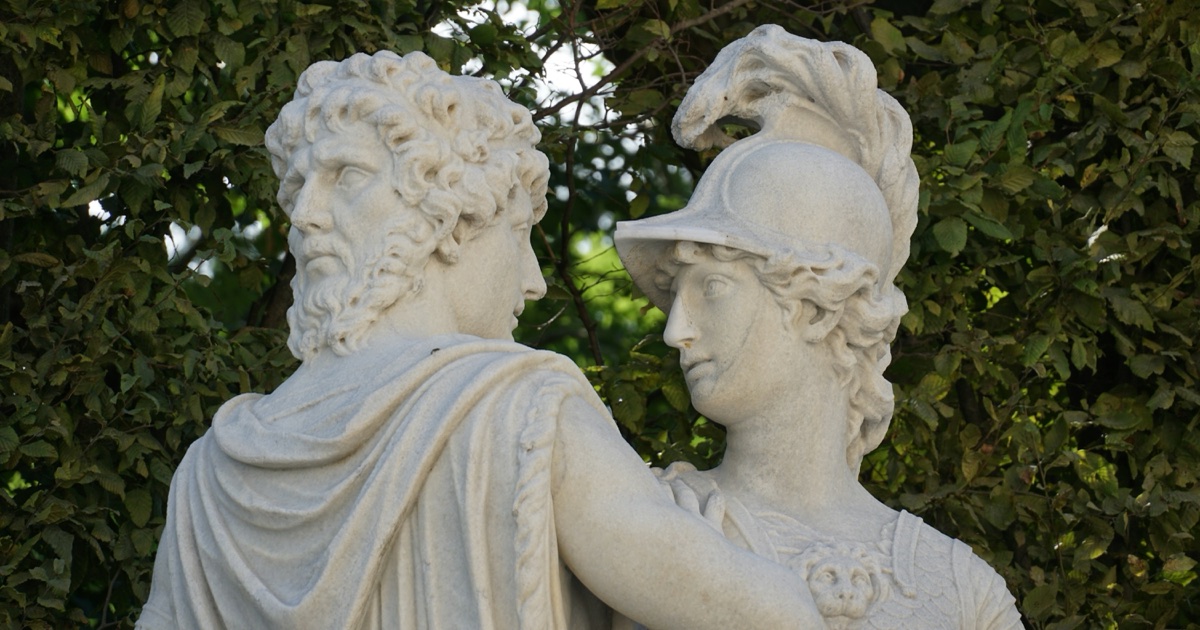 The two-faced Janus beside Bellona in an eighteenth-century stone sculpture in the Schönbrunn Palace Gardens, Vienna.